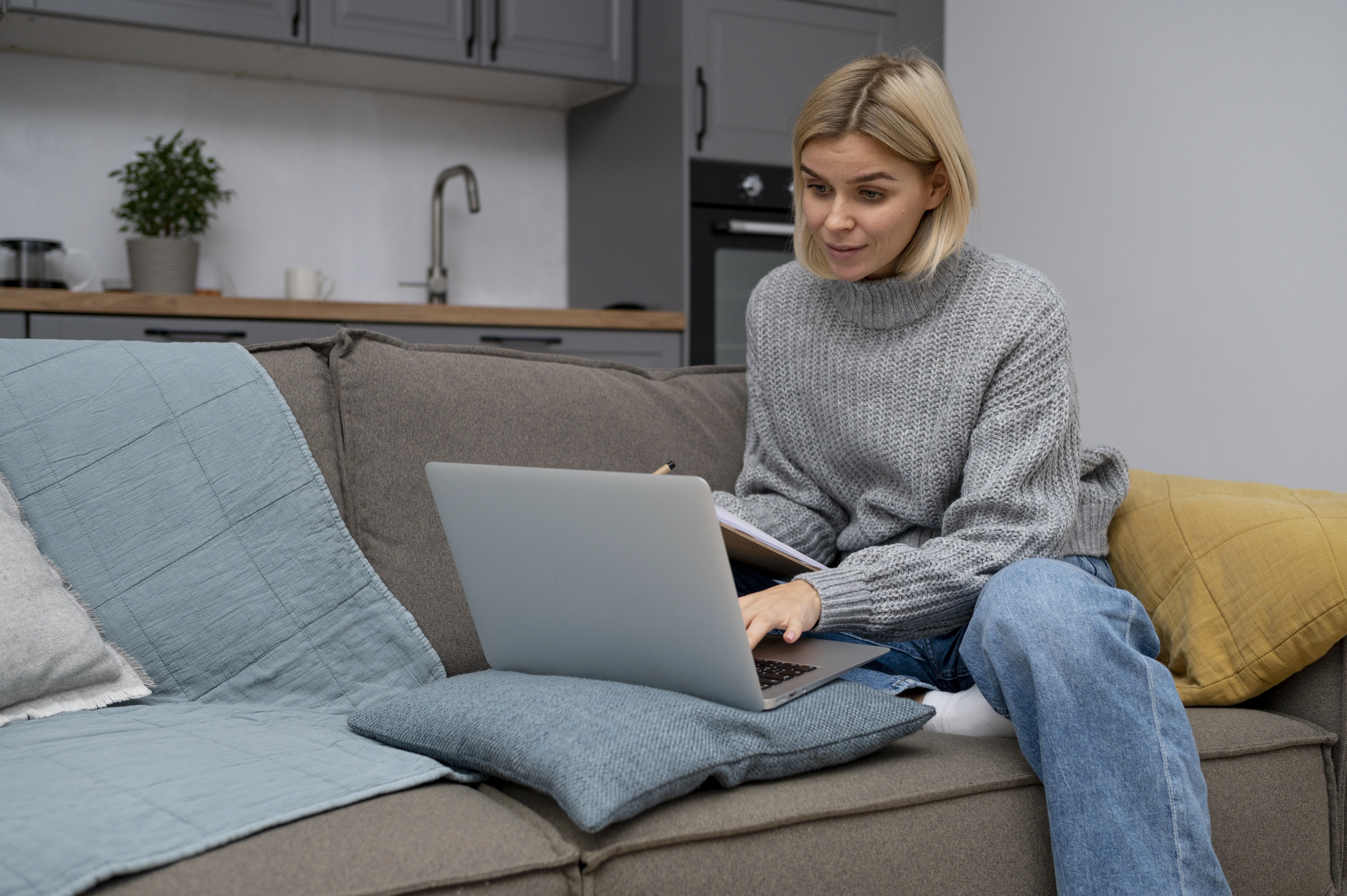 medium shot woman sitting couch
