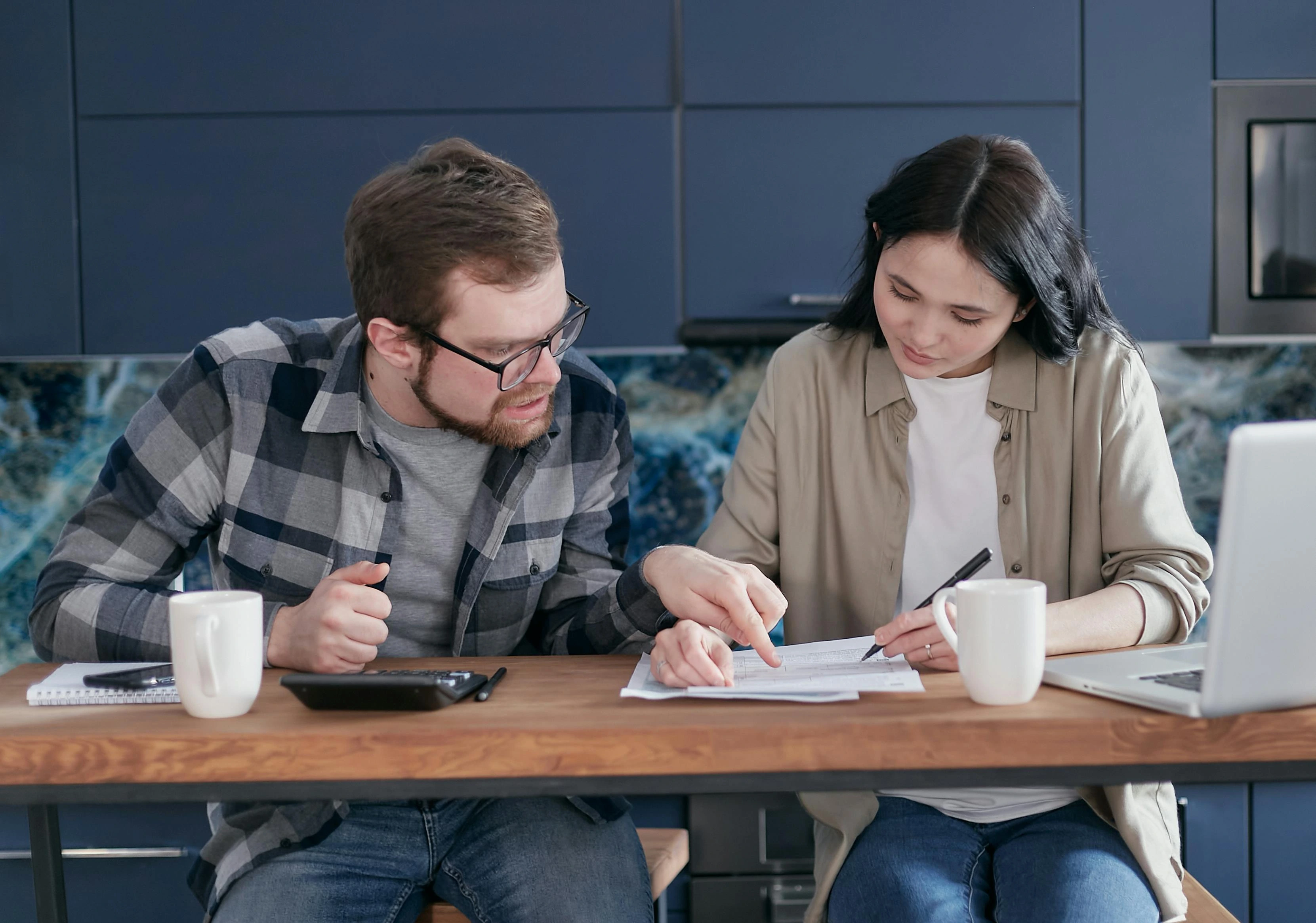 Couple looking at solar grants and incentives for their Surrey household