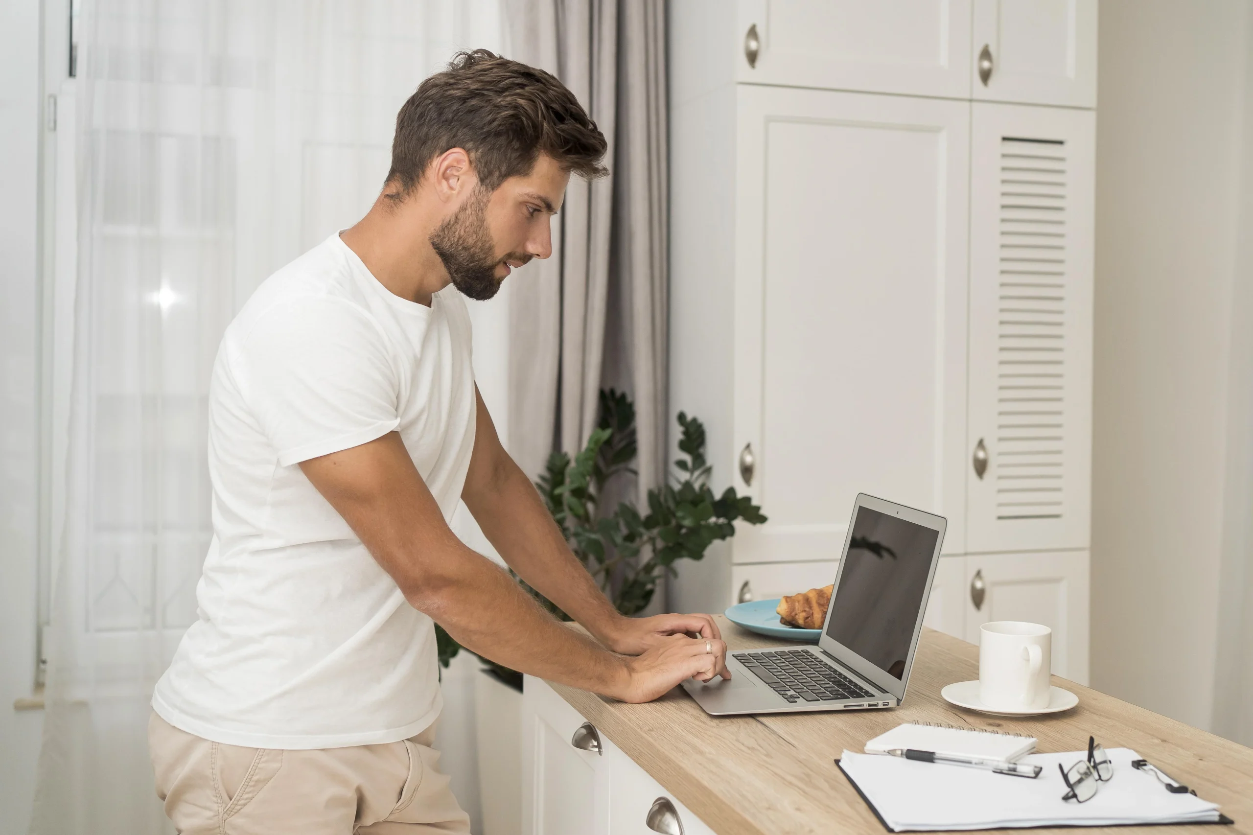 Homeowner researching whether a permit is needed to install an EV charger in the UK.
