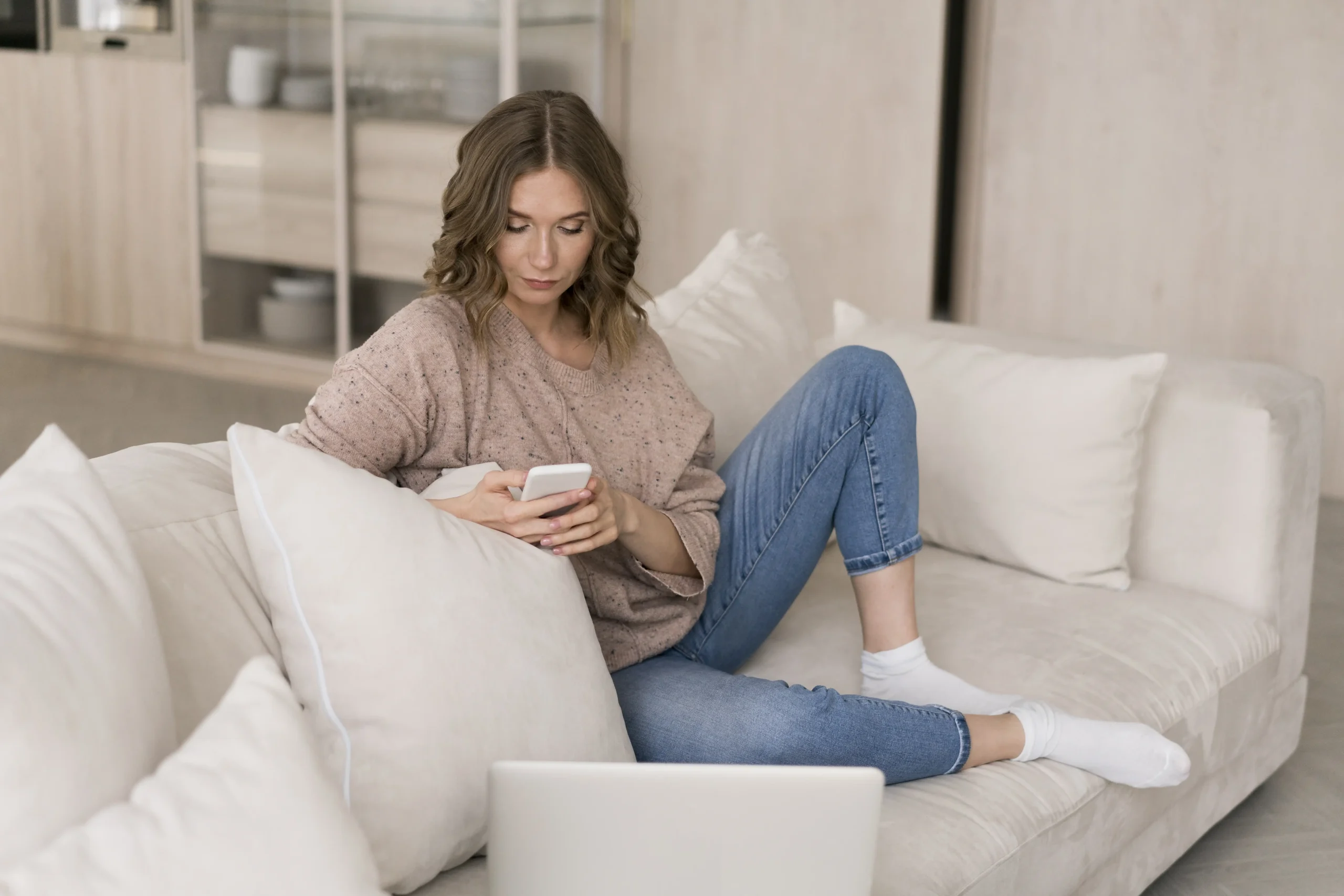 Woman browsing Upvolt smart monitoring app