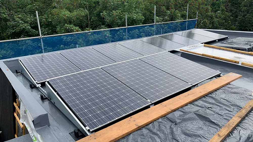 Ballasted south facing flat roof mounts for solar panels jpg