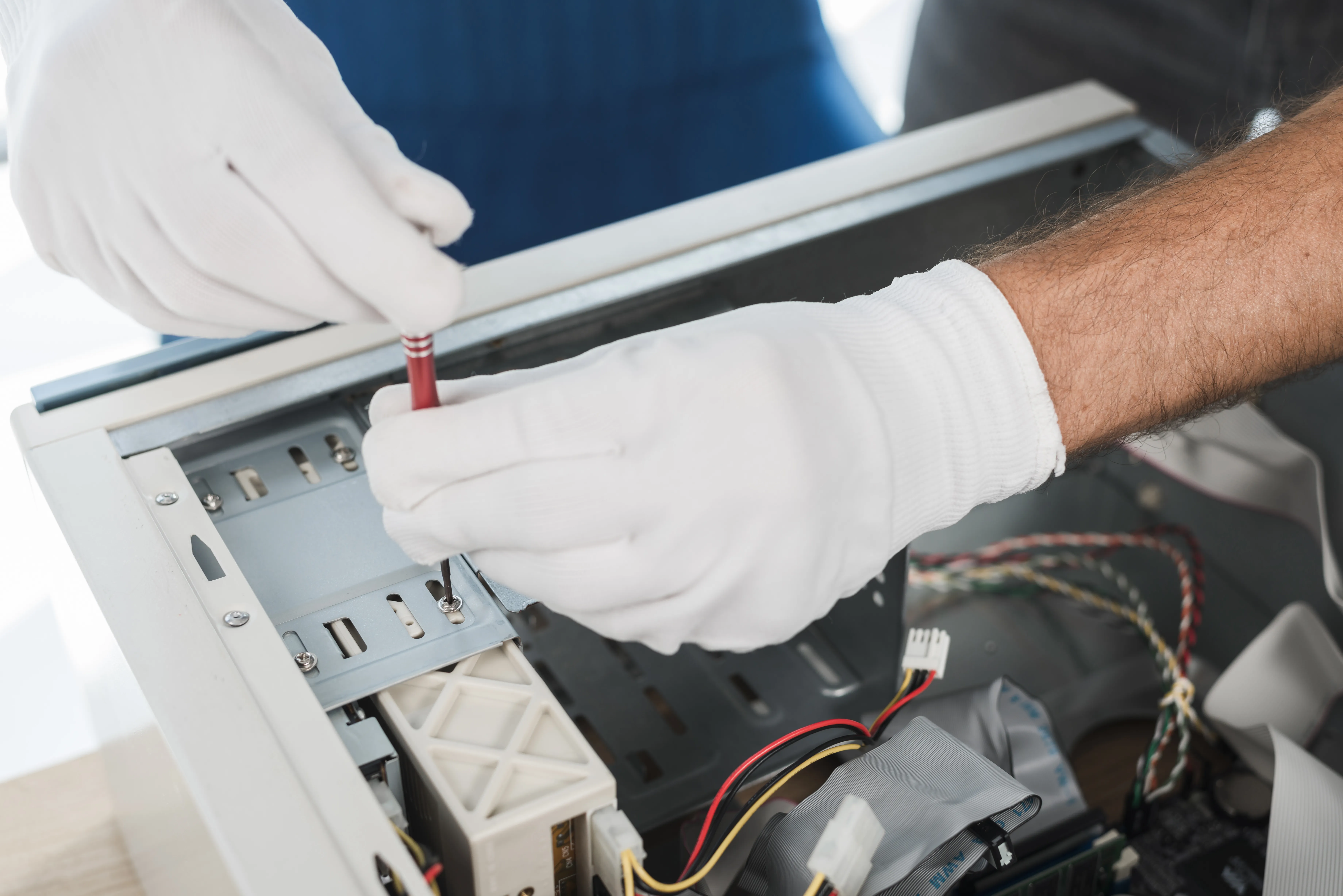 Technician diagnosing and repairing internal inverter components to restore solar system performance and prevent energy generation issues.