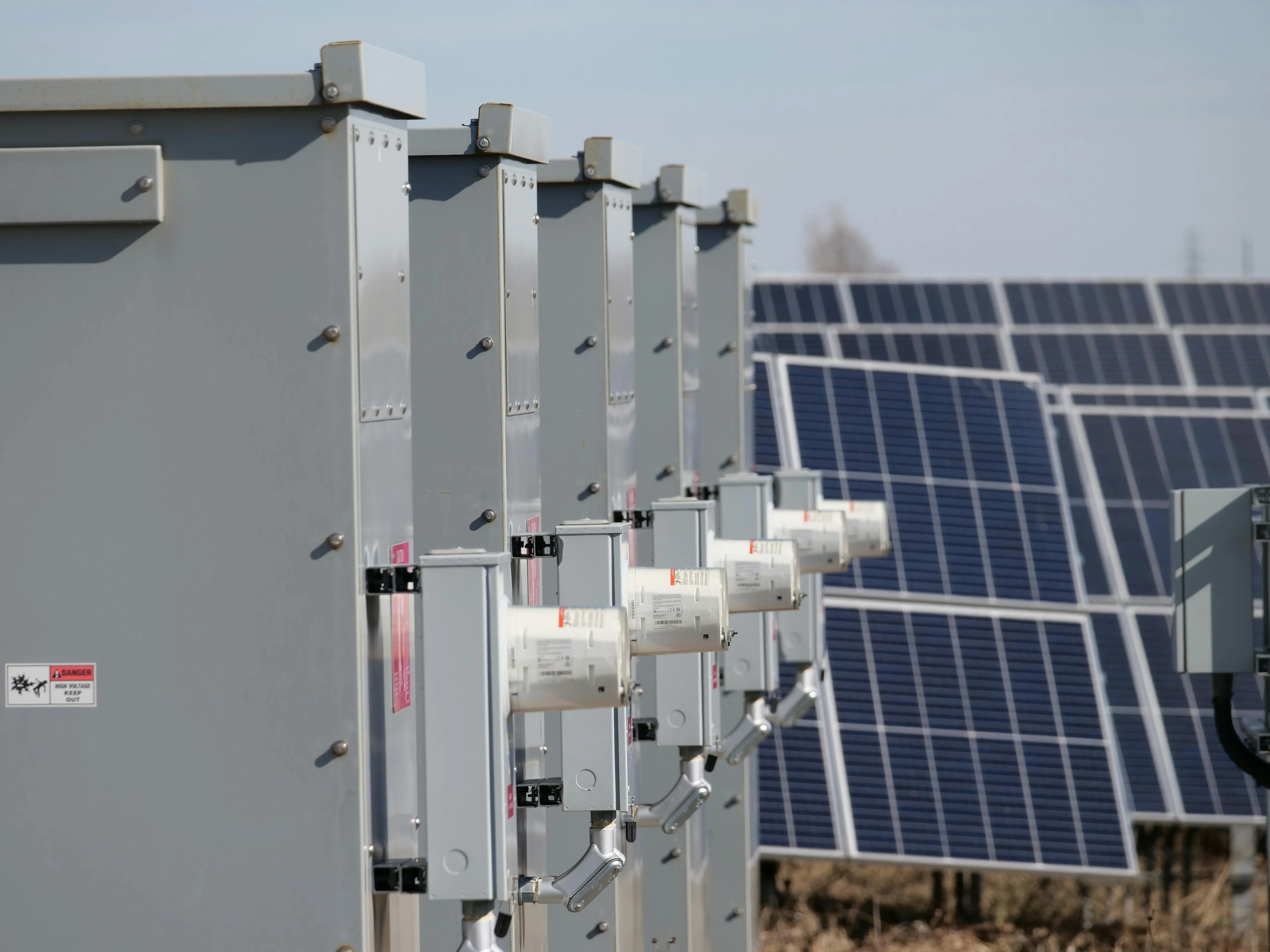 Large-scale Sungrow battery storage units installed alongside solar panels, illustrating how modern home battery systems support solar energy storage, smart energy management, backup power, and improved household energy efficiency.